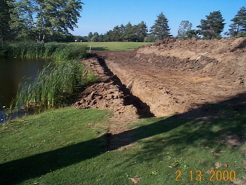 Trenching for the footer for a reclaimed bridgestone installation at Powderhorn CC Hole 1.jpg :: Trenching for the footer for a reclaimed bridgestone installation at Powderhorn Country Club in Madison OH Hole 1