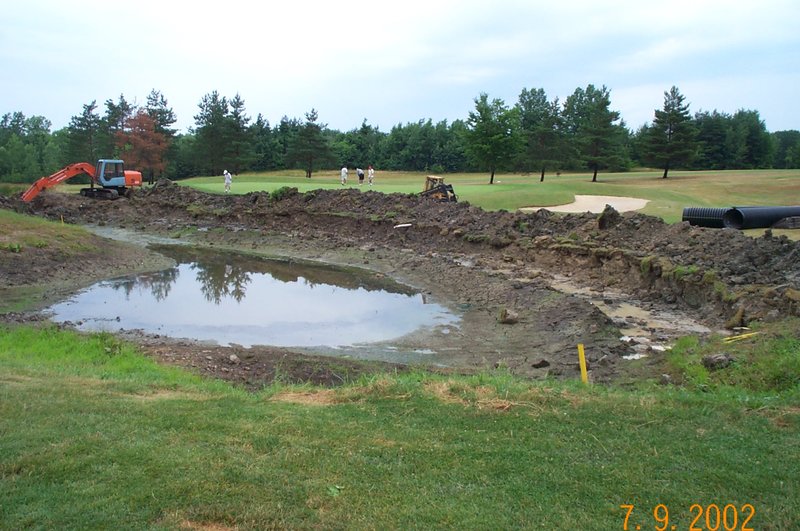 Trenching the footer for a bridgestone installation at Powderhorn Country Club Madison OH Hole 6.jpg :: Trenching for the footer for a reclaimed bridgestone installation at Powderhorn Country Club in Madison OH Hole 6