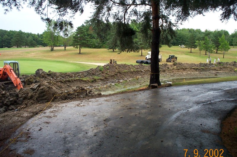 Trenching the footer for a reclaimed bridgestone installation Powderhorn Country Club Hole 6.jpg :: Trenching for the footer for a reclaimed bridgestone installation at Powderhorn Country Club in Madison OH Hole 6