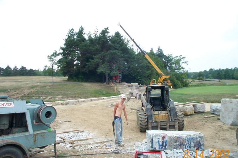 Trimming the reclaimed bridgestone for installation at Powderhorn Country Club Madison OH Hole 6.jpg :: Trimming the reclaimed bridgestone for installation at Powderhorn Country Club in Madison OH Hole 6