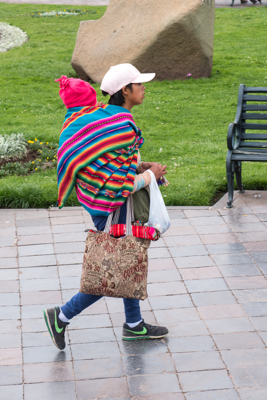 RL5_8659.jpg :: Woman carrying a baby, Plaza de Armas of Cusco