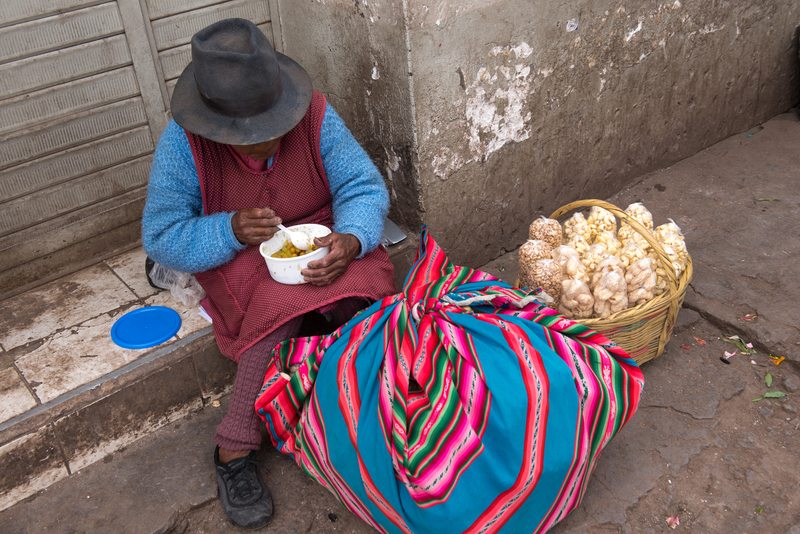 RL5_8699.jpg :: Woman eating lunch, Cusco Market