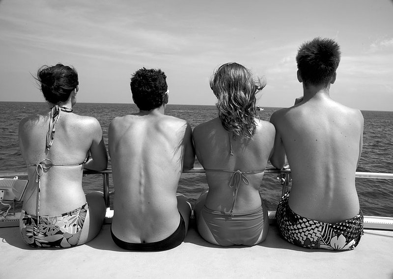 IMG_1954.jpg :: Young tourists on a liveaboard in the Similan Islands.
