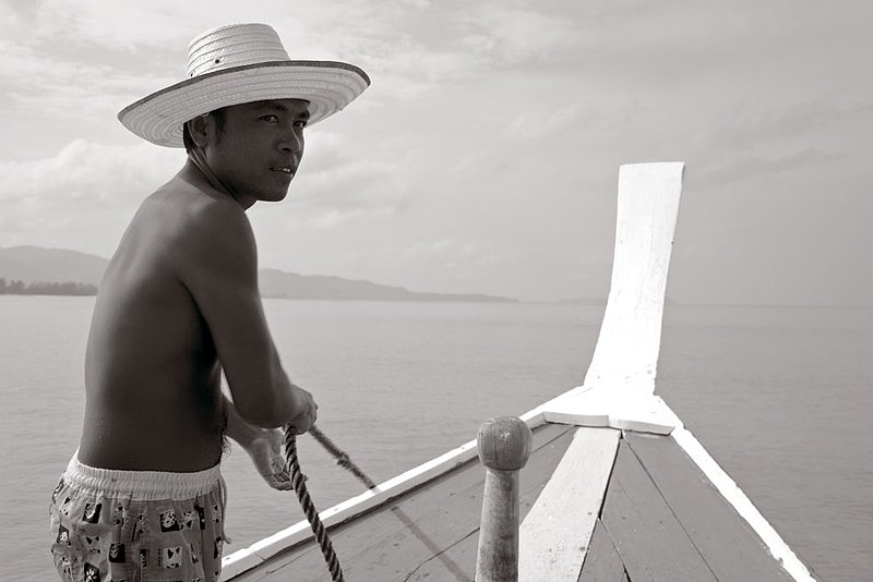 IMG_2091.jpg :: Thai boat captain off of Khao Lak, Thailand.