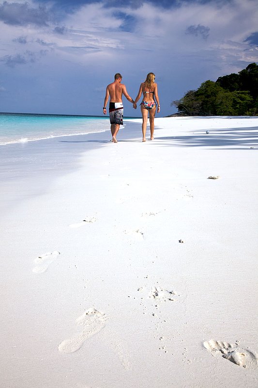 IMG_2347.jpg :: A couple enjoys one another's company on the white sand beach of Koh Tachai, Andaman Sea, Thailand.