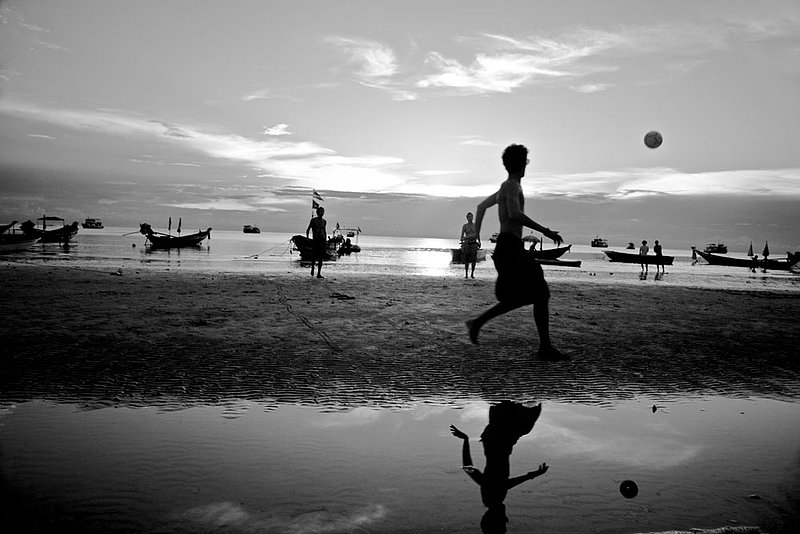 IMG_2612.jpg :: Tourist play soccer on Sairee Beach at sunset, Koh Tao, Thailand