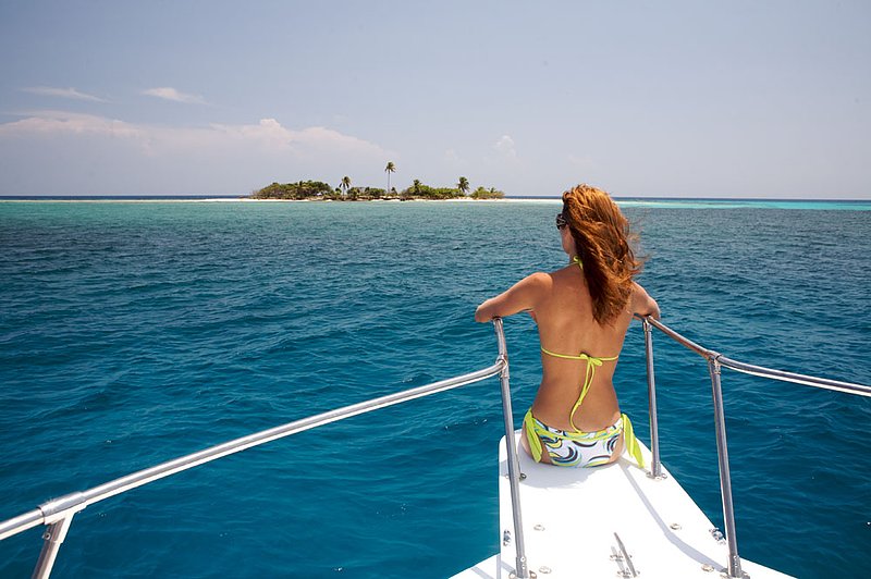 IMG_4447.jpg :: A tourist enjoying the view of Pigeon Cay, Roatan, Honduras.