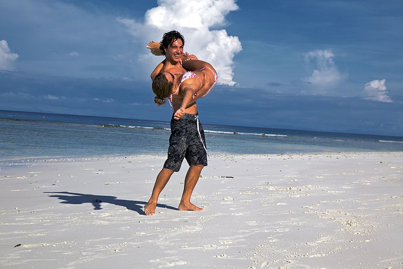 IMG_6093.jpg :: A couple enjoys one another's company on the white sand beach of Koh Tachai, Andaman Sea, Thailand.