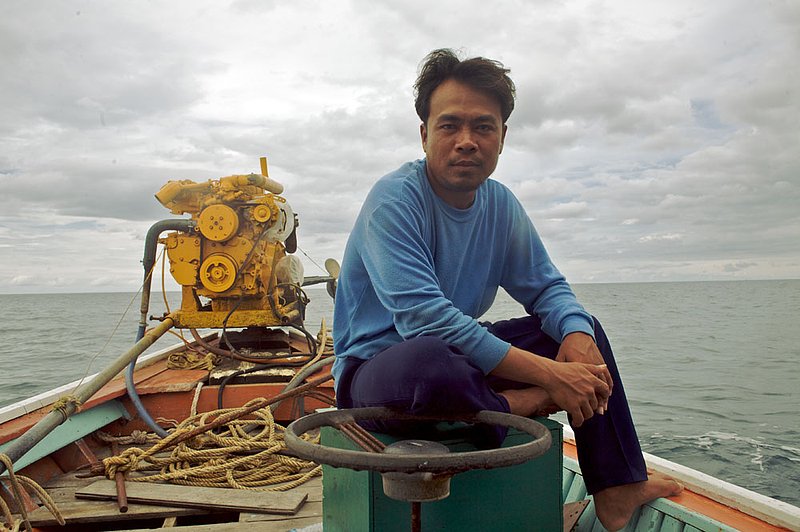 IMG_8086.jpg :: Thai boat captain off of Khao Lak, Thailand.