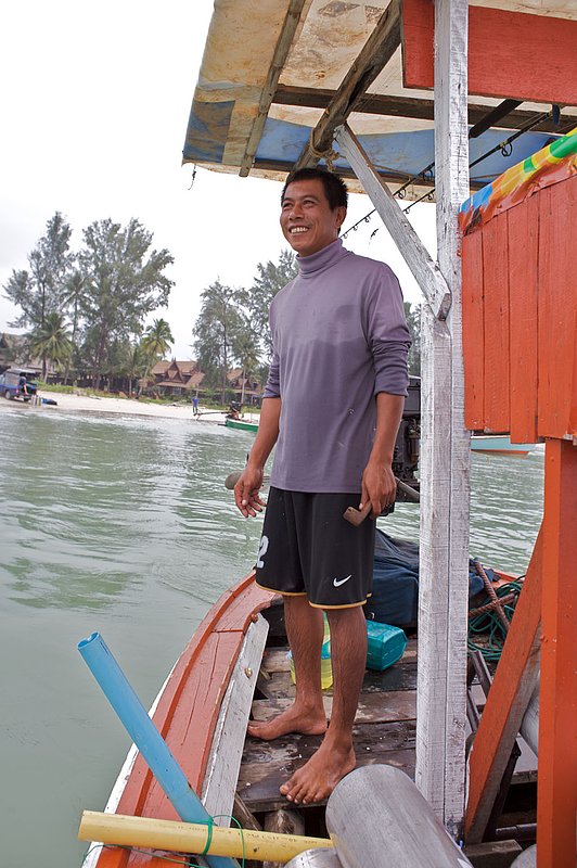 IMG_8344.jpg :: A Thai boat captain on his longtail, Khao Lak, Thailand.