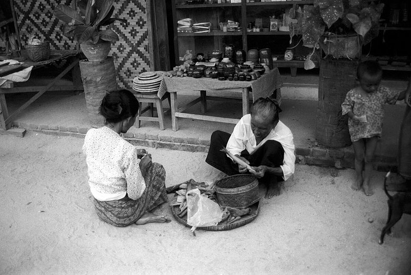 cigarrollers.jpg :: Two Burmese elders rolling cigars to cell in Bagan, Myanmar.