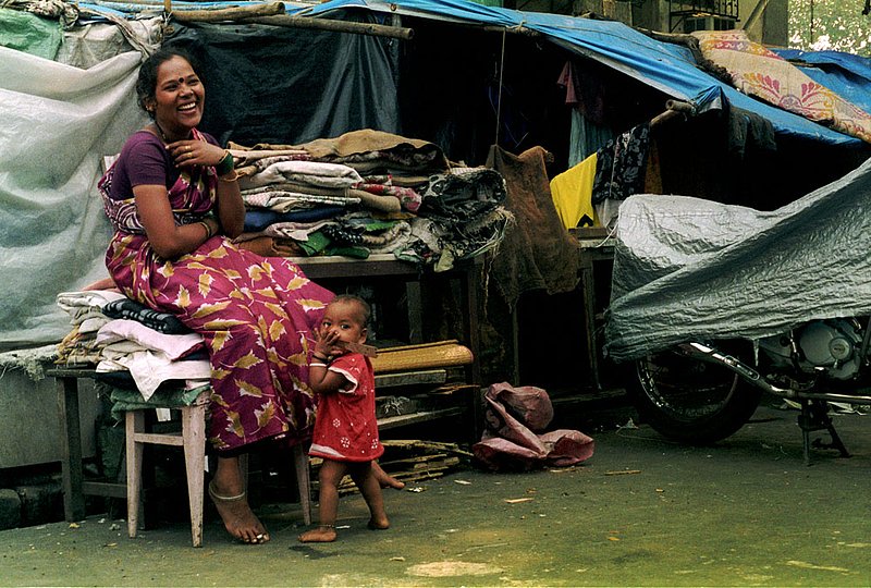 indianwomanandbaby.jpg :: A young Indian mother and child in a Mumabi shantytown, India.