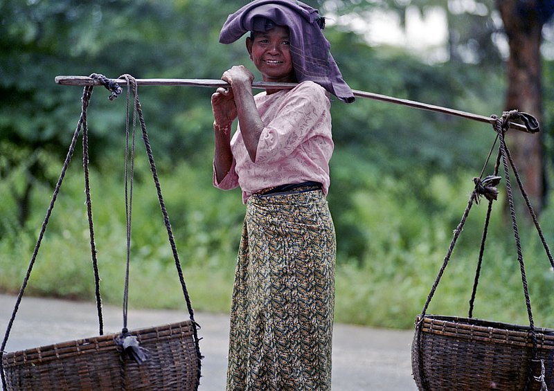 myanmar2005021.jpg :: A Burmese woman carrying a heavy load near Bagan, Myanmar.