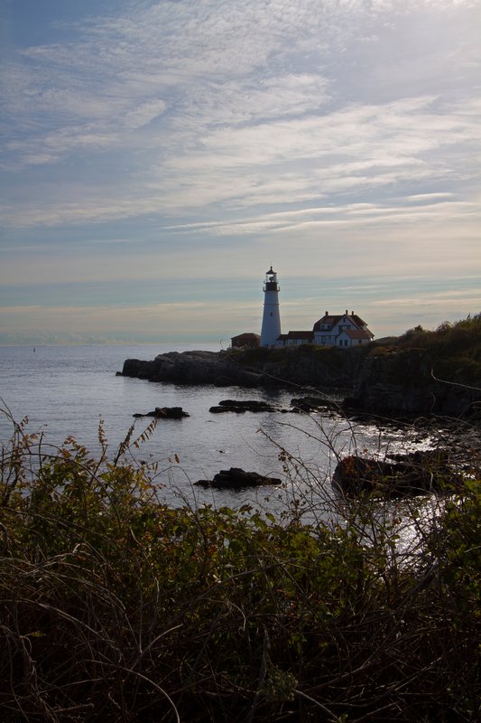 ME0601.jpg :: A late afternoon portrait glimpse at the Portland Headlight as it sits perched on a rocky Atlantic coastline

Portland ME - Fall 2010