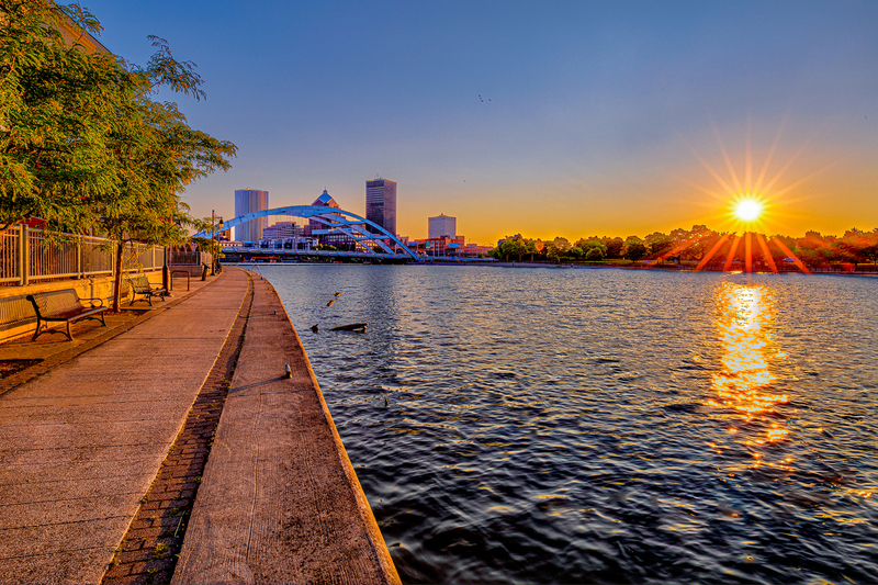 NY772.jpg :: A warm sunrise illuminates the downtown Rochester area

Rochester NY - Summer 2020