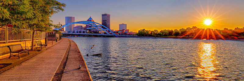 NY772c.jpg :: A warm sunrise illuminates this Rochester area in this 16\