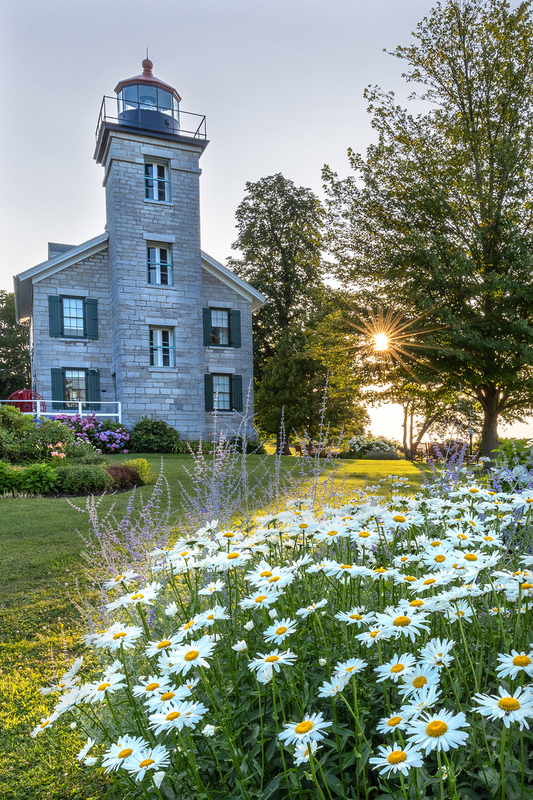 NY802.jpg :: Late evening Sun bursts onto the scene at the Sodus Point Lighthouse

Sodus NY - Summer 2023