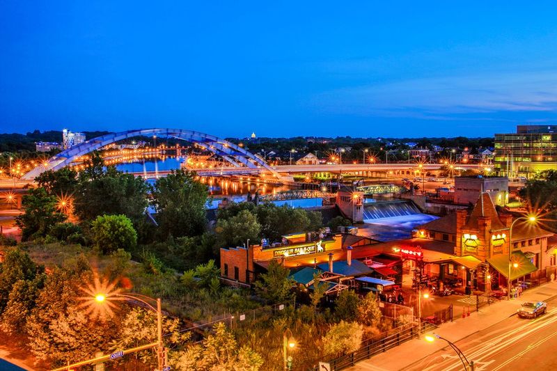 NY424.jpg :: Late twilight view of the Dinosaur Restaurant with Freddy Sue Bridge & Gensee River as the backdrop

Rochester NY - Summer 2015