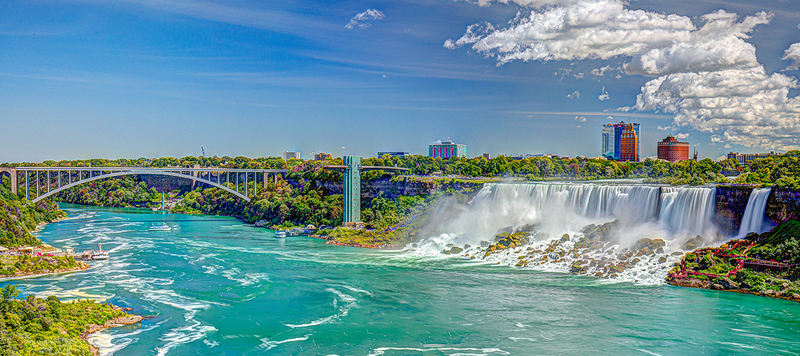 NF013b.jpg :: A panoramic view looking back at the American Falls & Rainbow Bridge

Niagara Falls Canada - Summer 2019