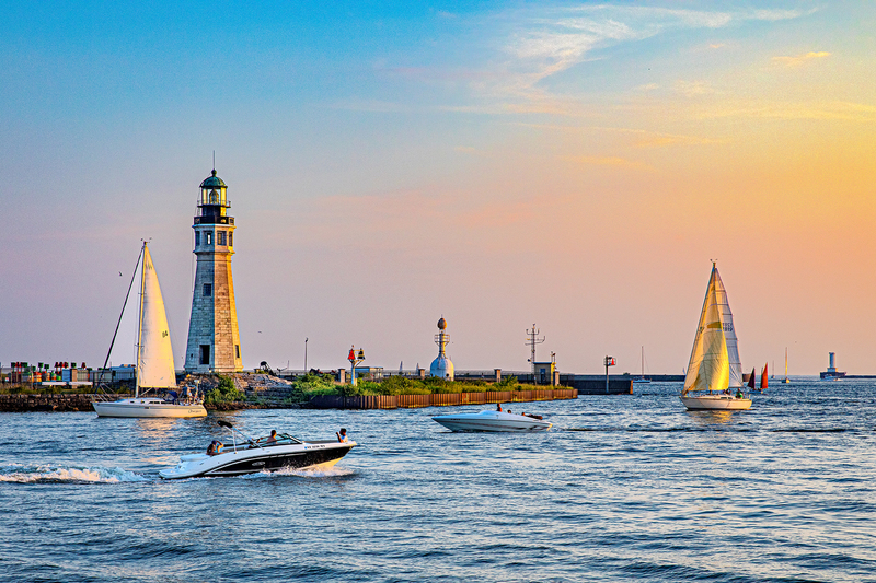 NY715.jpg :: The Buffalo Lighthouse, which was finished in 1818 as a guide for immigrants, stands tall amid a bevy of boaters on a hot summer day

Buffalo NY - Summer 2019