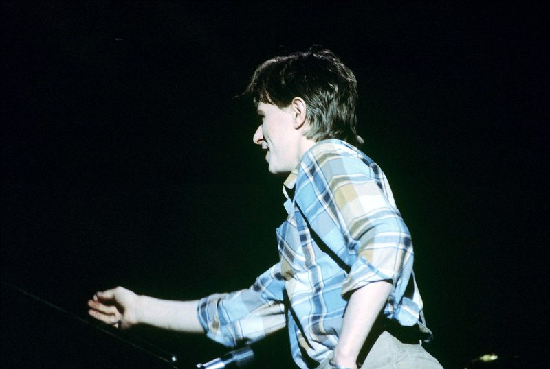 Bowie-Iggy  119.jpg :: Bowie agreed to tour & play keyboards on Iggy's 1977 tour..trying to get a good photo of Bowie on stage was difficult as he sat way off to the side & in the dark..it was Iggy's show anyway, but the lights finally came down on Bowie at the very end...