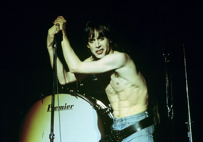 Iggy 4-13-77  102.jpg :: Bowie agreed to tour & play keyboards on Iggy's 1977 tour..trying to get a good photo of Bowie on stage was difficult as he sat way off to the side & in the dark..it was Iggy's show anyway, but the lights finally came down on Bowie at the very end...