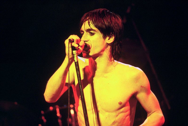 Iggy 4-13-77  104.jpg :: Bowie agreed to tour & play keyboards on Iggy's 1977 tour..trying to get a good photo of Bowie on stage was difficult as he sat way off to the side & in the dark..it was Iggy's show anyway, but the lights finally came down on Bowie at the very end...