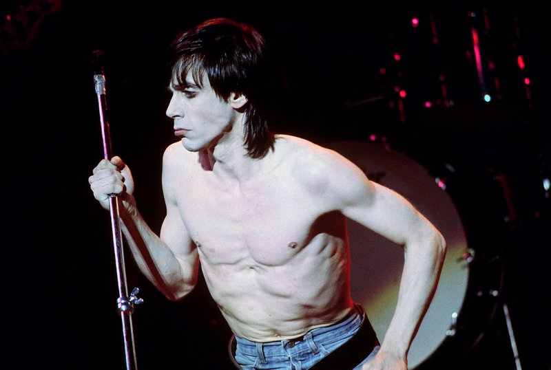 Iggy 4-13-77  109.jpg :: Bowie agreed to tour & play keyboards on Iggy's 1977 tour..trying to get a good photo of Bowie on stage was difficult as he sat way off to the side & in the dark..it was Iggy's show anyway, but the lights finally came down on Bowie at the very end...