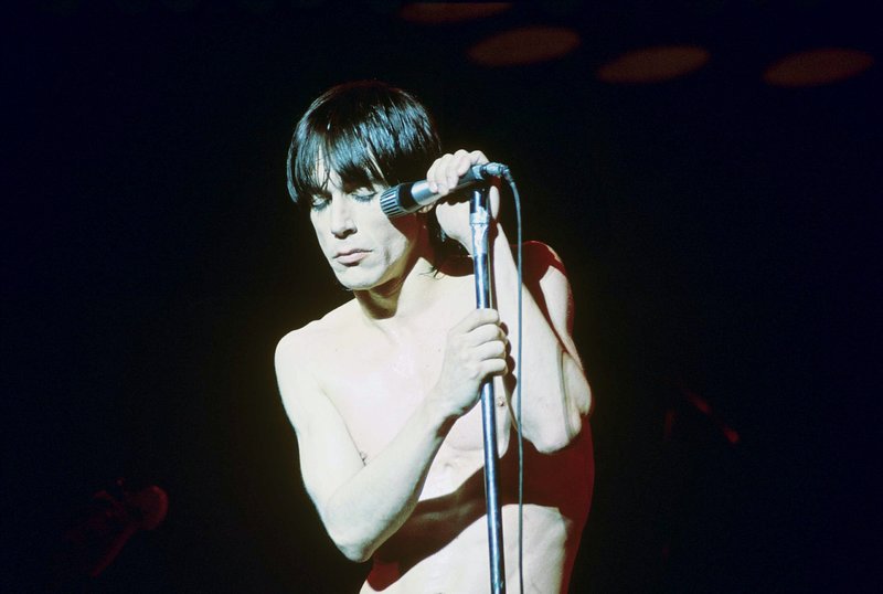 Iggy 4-13-77  112.jpg :: Bowie agreed to tour & play keyboards on Iggy's 1977 tour..trying to get a good photo of Bowie on stage was difficult as he sat way off to the side & in the dark..it was Iggy's show anyway, but the lights finally came down on Bowie at the very end...