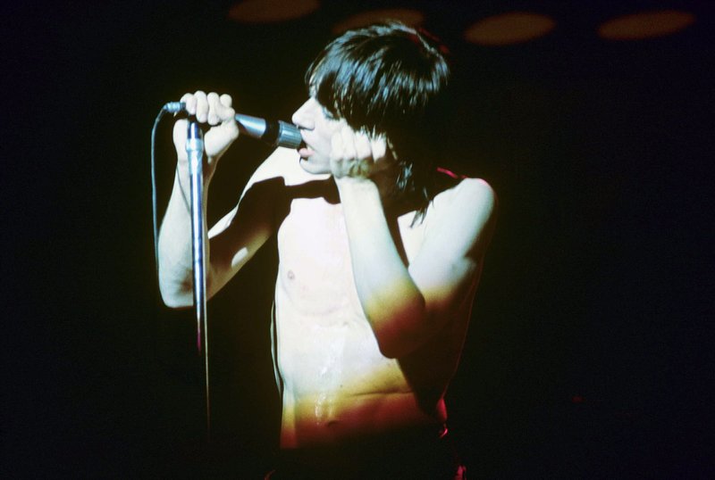 Iggy 4-13-77  113.jpg :: Bowie agreed to tour & play keyboards on Iggy's 1977 tour..trying to get a good photo of Bowie on stage was difficult as he sat way off to the side & in the dark..it was Iggy's show anyway, but the lights finally came down on Bowie at the very end...