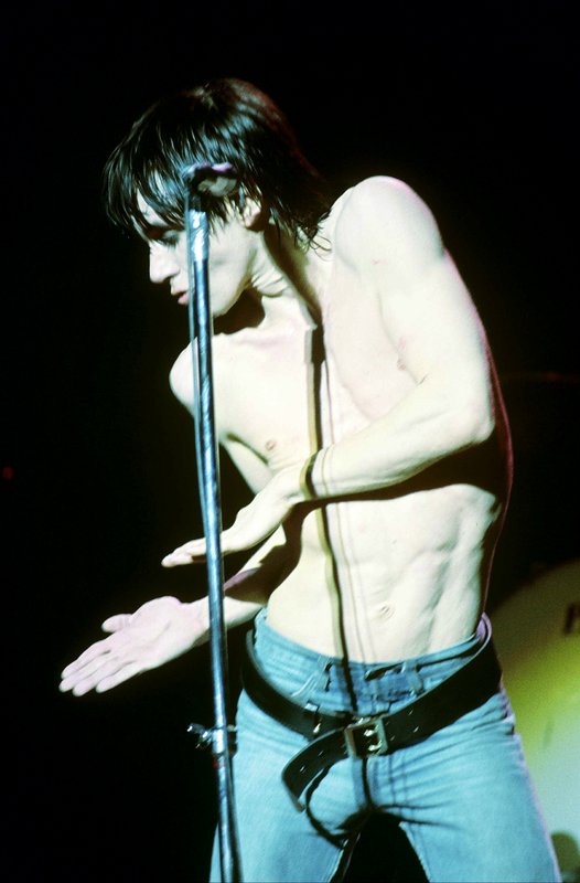 Iggy 4-13-77  115.jpg :: Bowie agreed to tour & play keyboards on Iggy's 1977 tour..trying to get a good photo of Bowie on stage was difficult as he sat way off to the side & in the dark..it was Iggy's show anyway, but the lights finally came down on Bowie at the very end...