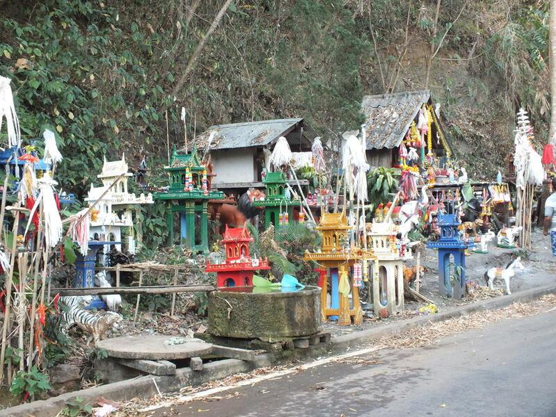 R2.jpg ::  At the highest point, these shrines have been erected alongside the road by the local hill-tribe villagers.  
