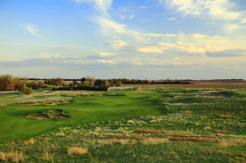 A106--0150 with signature.jpg :: The par five opening hole at Awarii Dunes, a private golf club located in Kearney, Nebraska.  Designed by Jim Engh and built by Neibor Construction.  May, 2011; PM shoot.  Photograph by Paul Hundley.