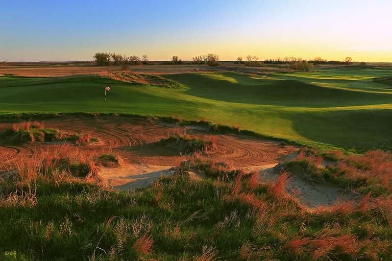A106--1256 with signature.jpg :: The 12th hole at Awarii Dunes, a private golf club located in Kearney, Nebraska.  Designed by Jim Engh and built by Neibor Construction.  April, 2011; AM shoot.  Photograph by Paul Hundley.