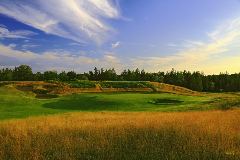 E101--0256  1200px with signature  V2  SS.jpg :: The par 4 second hole at Erin Hills.  Erin Hills is a daily fee golf course in Erin, Wisconsin.  It was designed by Hurdzan/Fry Designs and Ron Whitten and built by Landscapes Unlimited, LLC.  Photograph by Paul Hundley; July, 2011.