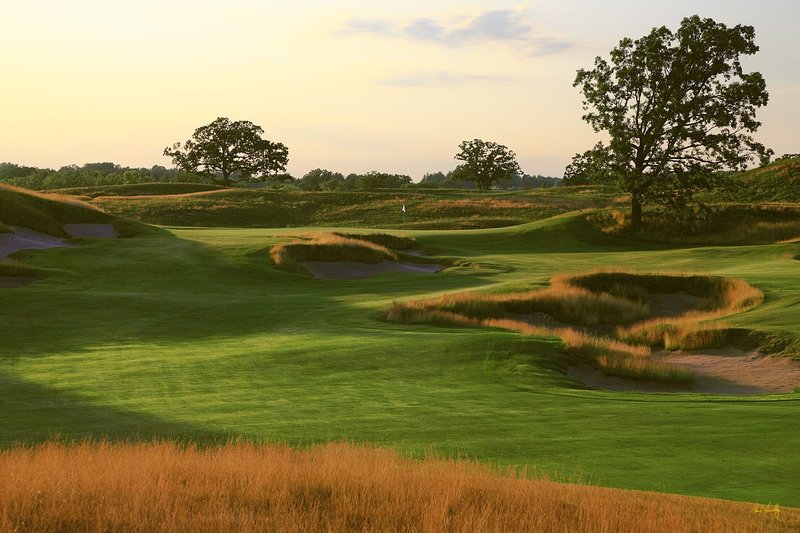 E101--0458  1200px with signature  V2  SS.jpg :: The par 4 fourth hole at Erin Hills.  Erin Hills is a daily fee golf course in Erin, Wisconsin.  It was designed by Hurdzan/Fry Designs and Ron Whitten and built by Landscapes Unlimited, LLC.  Photograph by Paul Hundley; July, 2011.