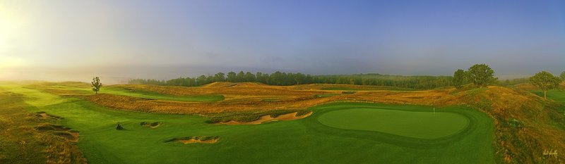 E101--0757  V1  1500px  SS - with signature.jpg :: The par five 7th hole at Erin Hills, a daily fee golf course in Erin, Wisconsin.  Erin Hills was designed by Hurdzan/Fry and Ron Whitten and built by Landscapes Unlimited, LLC, and has been choosen to host the 2011 US Amateur Chanpionship and the 2017 US Open Championship.  Photo by Paul Hundley; taken in September, 2012.