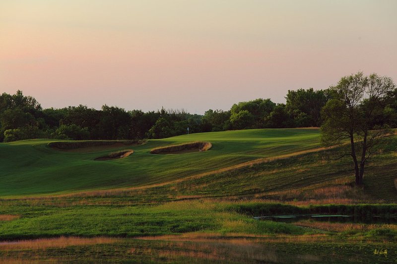 E101--0855  1200px with signature  V1  SS.jpg :: The par 4 eighth hole at Erin Hills.  Erin Hills is a daily fee golf course in Erin, Wisconsin.  It was designed by Hurdzan/Fry Designs and Ron Whitten and built by Landscapes Unlimited, LLC.  Photograph by Paul Hundley; July, 2011.