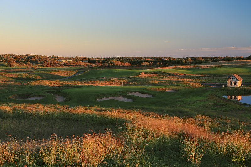 E101--0951  1200 px  V1  SS1.jpg :: The par three 9th hole (with the 18th green in the background) at Erin Hills.  Erin Hills is a daily fee golf course in Erin, Wisconsin.  It was designed by Hurdzan/Fry Designs and Ron Whitten and built by Landscapes Unlimited, LLC.  September, 2010.  PM shoot.  Photo by Paul Hundley.