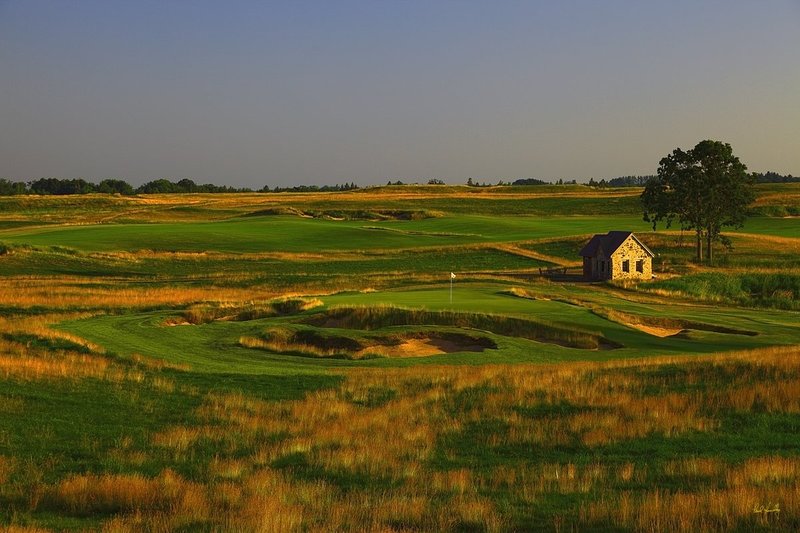 E101--0955  1200px with signature  V2  SS.jpg :: The par 3 ninth hole at Erin Hills.  Erin Hills is a daily fee golf course in Erin, Wisconsin.  It was designed by Hurdzan/Fry Designs and Ron Whitten and built by Landscapes Unlimited, LLC.  Photograph by Paul Hundley; July, 2011.