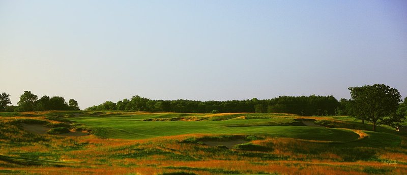 E101--1052  1200px with signature  V1  SS.jpg :: The par 4 tenth hole at Erin Hills.  Erin Hills is a daily fee golf course in Erin, Wisconsin.  It was designed by Hurdzan/Fry Designs and Ron Whitten and built by Landscapes Unlimited, LLC.  July, 2011;  PM shoot.  Photo by Paul Hundley.