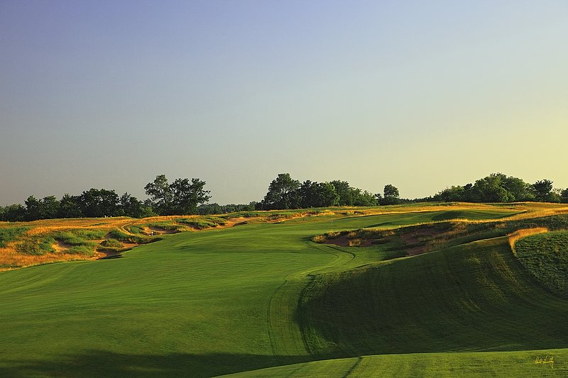 E101--1054  1200px with signature  V2  SS.jpg :: The par 4 tenth hole at Erin Hills.  Erin Hills is a daily fee golf course in Erin, Wisconsin.  It was designed by Hurdzan/Fry Designs and Ron Whitten and built by Landscapes Unlimited, LLC.  Photograph by Paul Hundley; July, 2011.