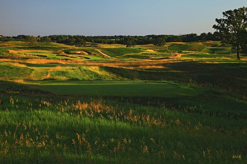 E101--1162  1200px with signature  V1  SS.jpg :: The 11th hole (from the black tees) at Erin Hills.  Erin Hills is a daily fee golf course in Erin, Wisconsin.  It was designed by Hurdzan/Fry Designs and Ron Whitten and built by Landscapes Unlimited, LLC.  July, 2011;  PM shoot.  Photo by Paul Hundley.