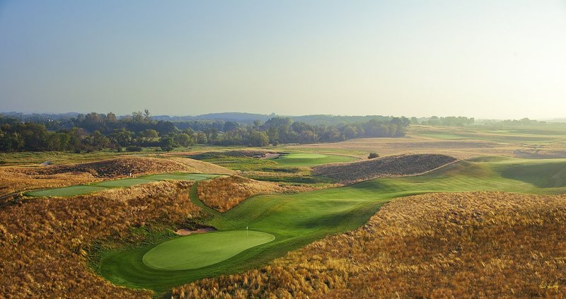 E101--1256  V1  1500px  SS - with signature.jpg :: The par four 12th hole (foreground) and the par three 13th hole (above and left of #12)  at Erin Hills, a daily fee golf course in Erin, Wisconsin.  Erin Hills was designed by Hurdzan/Fry and Ron Whitten and built by Landscapes Unlimited, LLC, and has been choosen to host the 2011 US Amateur Chanpionship and the 2017 US Open Championship.  Photo by Paul Hundley; taken in September, 2012.