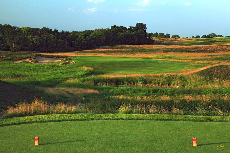 E101--1351  1200px with signature  V1  SS.jpg :: The par 3 thirteenth hole at Erin Hills.  Erin Hills is a daily fee golf course in Erin, Wisconsin.  It was designed by Hurdzan/Fry Designs and Ron Whitten and built by Landscapes Unlimited, LLC.  Photograph by Paul Hundley; July, 2011.