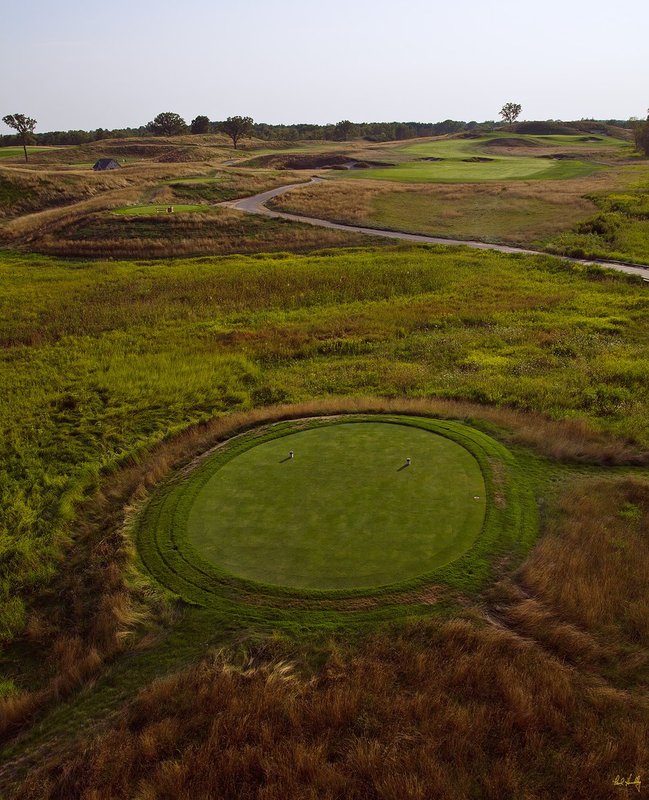E101--1455  V1  1500px  with signature  SS.jpg :: The par five 14th hole at Erin Hills, a daily fee golf course in Erin, Wisconsin.  Erin Hills was designed by Hurdzan/Fry and Ron Whitten and built by Landscapes Unlimited, LLC, and has been choosen to host the 2011 US Amateur Chanpionship and the 2017 US Open Championship.  Photo by Paul Hundley; taken in August, 2012.