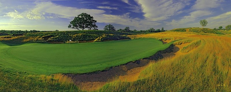 E101--1655  1200px with signature  V2  SS.jpg :: The par 3 sixteenth hole at Erin Hills.  Erin Hills is a daily fee golf course in Erin, Wisconsin.  It was designed by Hurdzan/Fry Designs and Ron Whitten and built by Landscapes Unlimited, LLC.  Photograph by Paul Hundley; July, 2011.