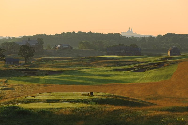 E101--1853  1200px with signature  V4  SS.jpg :: The par 5 finishing hole at Erin Hills.  Erin Hills is a daily fee golf course in Erin, Wisconsin.  It was designed by Hurdzan/Fry Designs and Ron Whitten and built by Landscapes Unlimited, LLC.  Photograph by Paul Hundley; July, 2011.