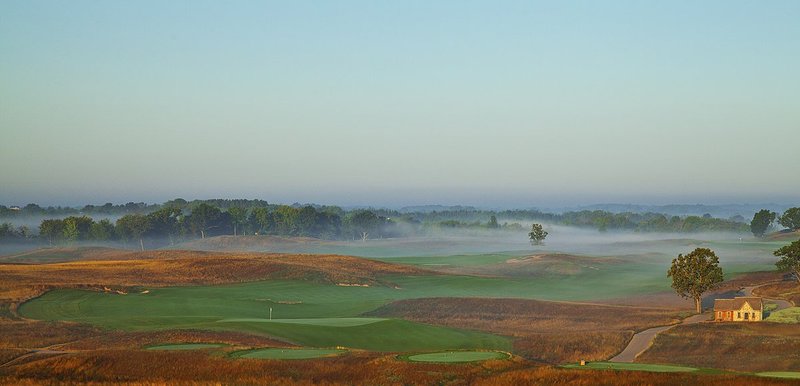 E101--1864  V1  1500px  SS - with signature1.jpg :: The approach to the 18th green (from behind) on a foggy morning (with the 10th tee boxes along the bottom of the frame and the 7th flag in the distance above the halfway house) at Erin Hills, a (Hurdzan/Fry and Ron Whitten design) daily fee golf course in Erin, Wisconsin. The course was built by Landscapes Unlimited, LLC. Erin Hills will also host the US Open Championship in 2017.   Photograph by Paul Hundley; August, 2012