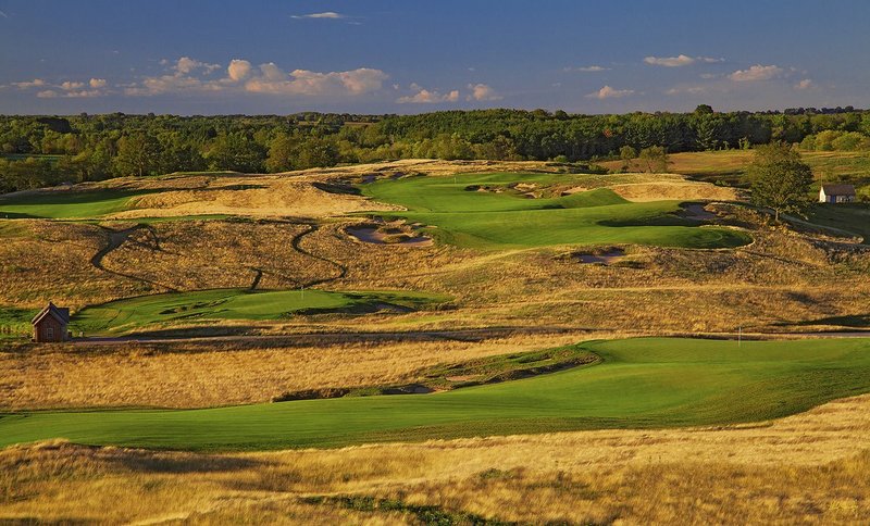 E101--1875  V1  1500px  SS - with signature.jpg :: The par five 18th green (Lower right), the par three 9th hole (center left) and the par rour 10th hole (upper right) at Erin Hills, a daily fee golf course in Erin, Wisconsin.  Erin Hills was designed by Hurdzan/Fry and Ron Whitten and built by Landscapes Unlimited, LLC, and has been choosen to host the 2011 US Amateur Chanpionship and the 2017 US Open Championship.  Photo by Paul Hundley; taken in September, 2012.